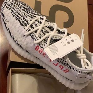 Size 10.5 Yeezy zebra never worn original box/tag